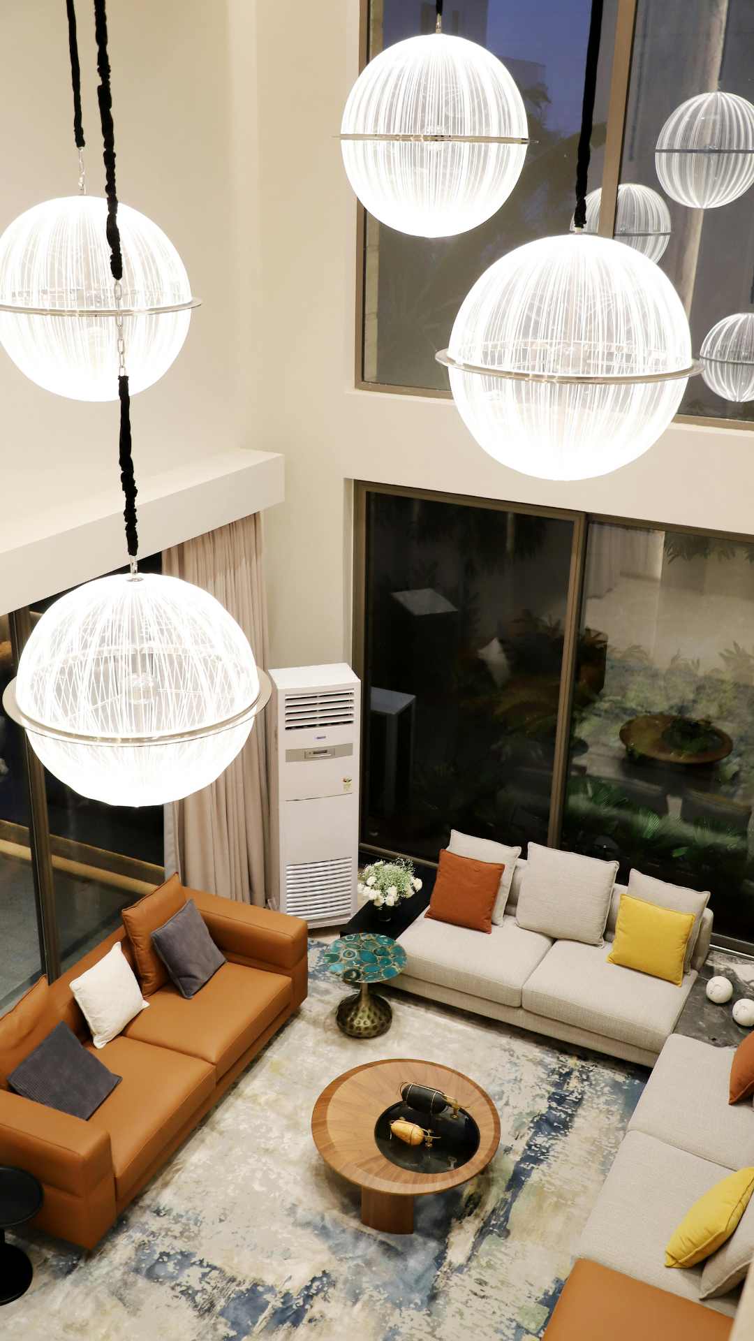Modern-home-lighting-inspiration- featuring-elegant-pendant-lights-warm-ambient-glow-and-cozy-interior-design-ideas.