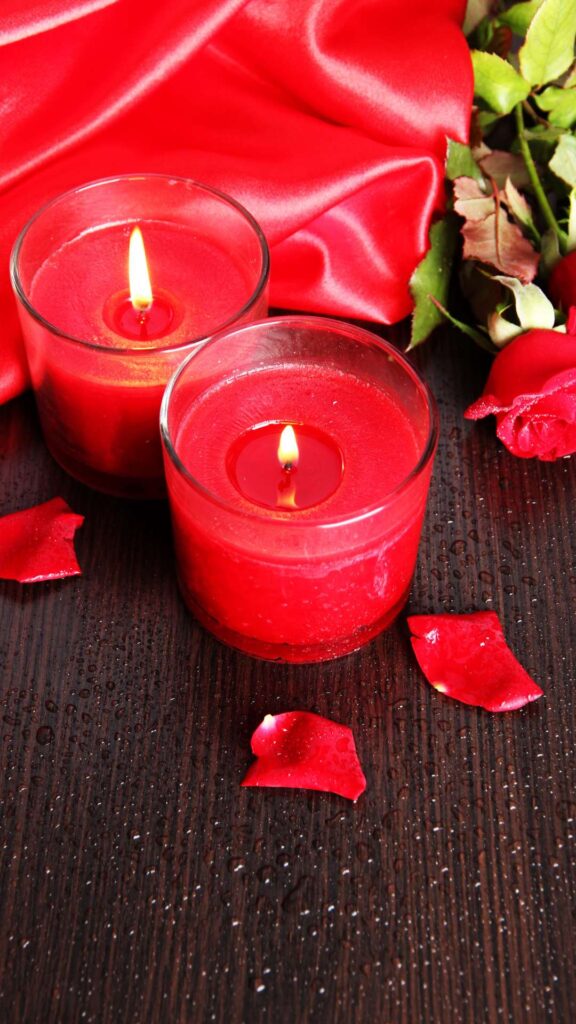 Red-themed-Valentine’s-Day-lighting- setup-with-candles-and-string-lights- showcasing-romantic-lighting-ideas- for-a-Valentine’s-Day-room-surprise.