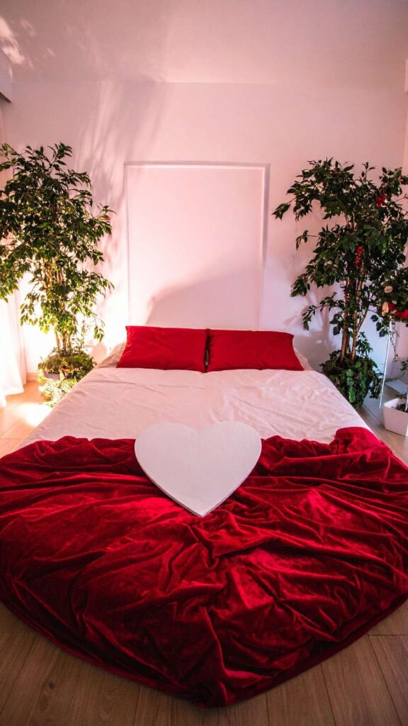 Luxurious-bedding-with-soft- romantic-fabrics-arranged-to-create-an-elegant-bedroom-atmosphere.