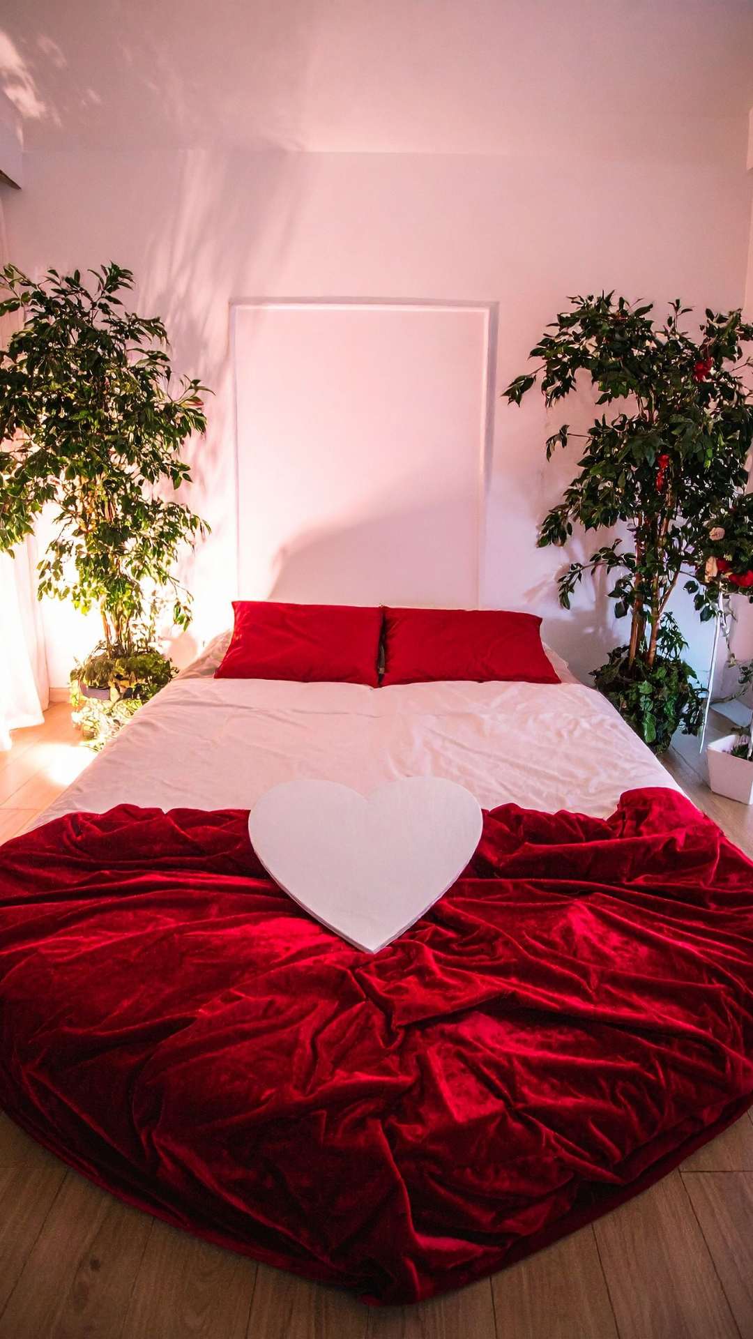 Luxurious-bedding-with-soft- romantic-fabrics-arranged-to-create-an-elegant-bedroom-atmosphere.