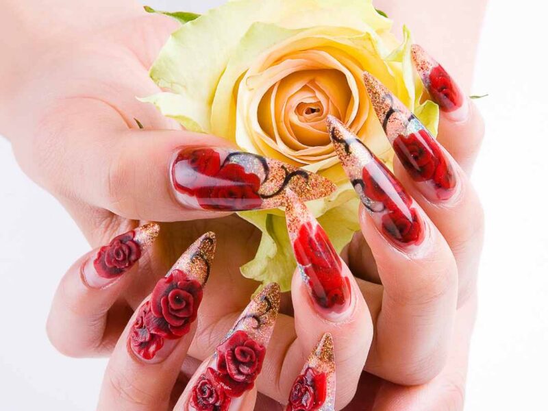 Beautiful-nails-designs-for-ladies- featuring-rose-flower-design-and- pointed-tip-ideal-for-women-who-love- romantic-nail-art.