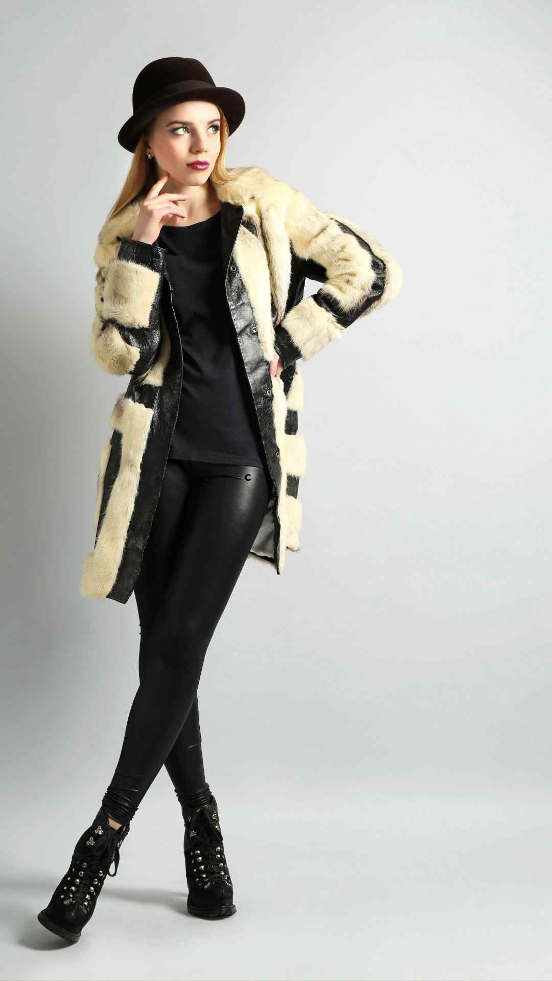 Trendy-fall-casual-chic-look-hat- jacket-black-leggings-and-ankle-high- boots-for-an-effortless-vibe.