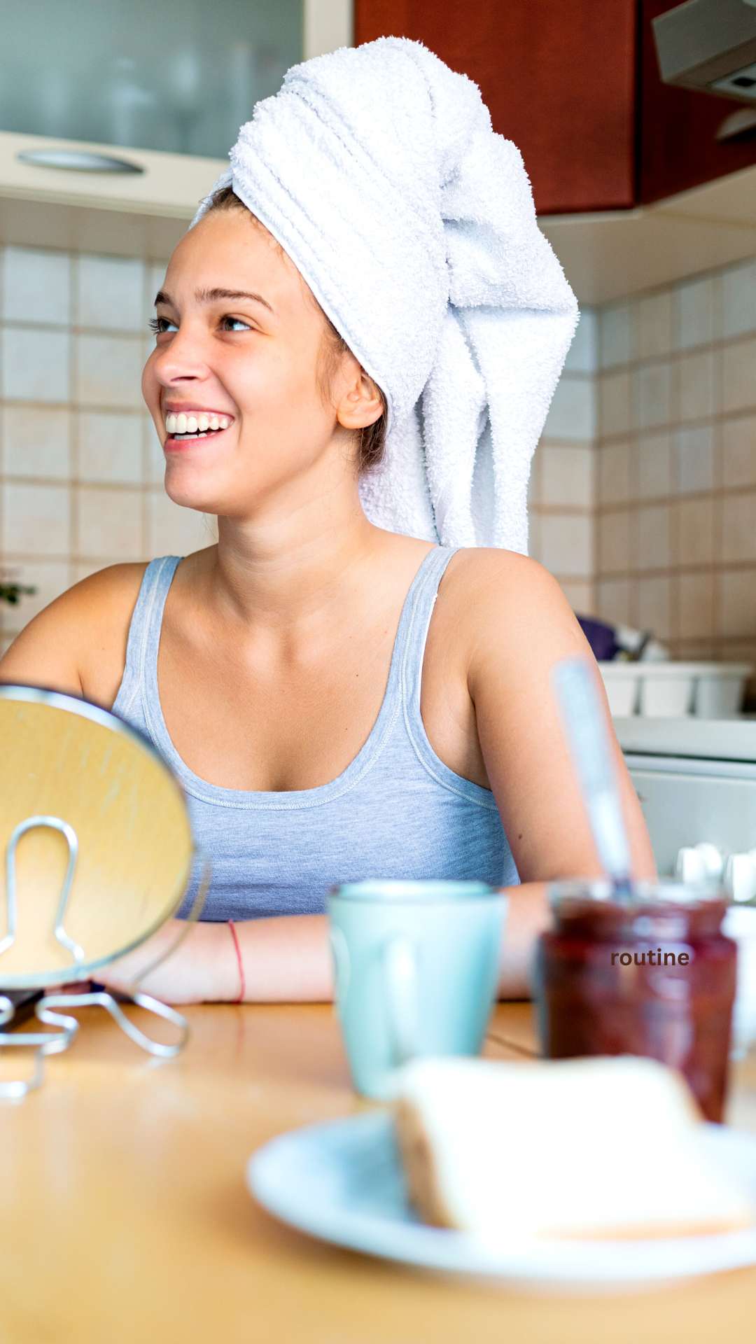 This-image-is-featuring-a-woman- with-towel-wrapped-around-her-hair-smiling-with-her-coffee-and-fruit-for-a-refreshing-morning-routine.