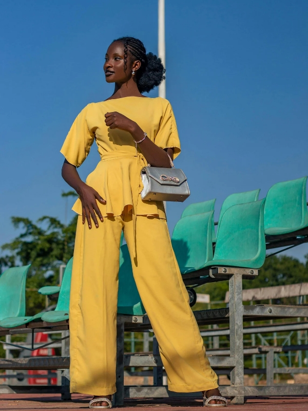 A-Spring-Jumpsuit-in-a-Light-Fabric-With-a-Statement-Belt-for-a-Modern-Stylish-Going-Out-Look