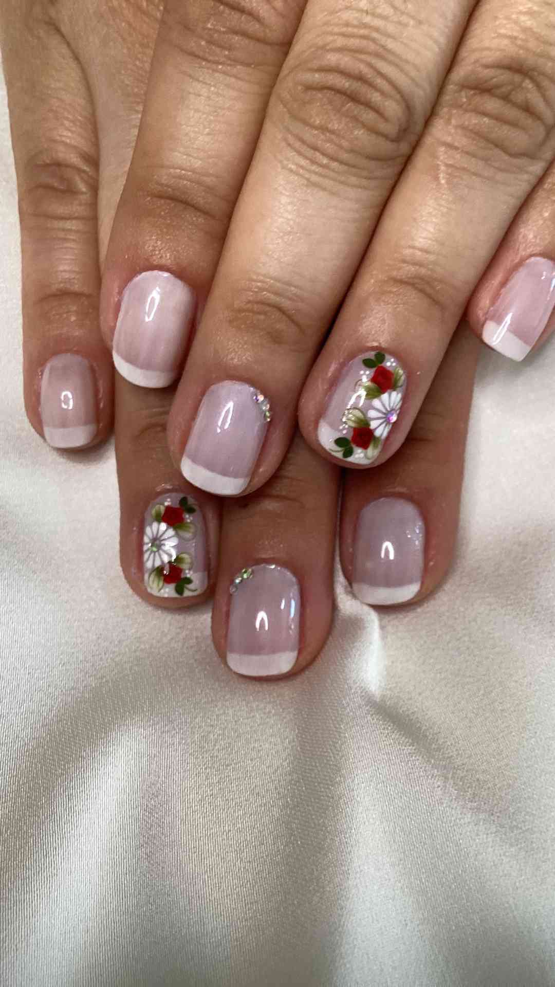 Floral-French-Tips-With-Tiny-Painted-Blossoms-That-Turn-the-Classic-Style-Into-Delicate-Wearable-Art