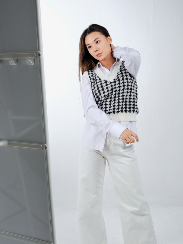 Soft-Knit-Vest-Layered-Over-a-Collared-Shirt-and-Paired-With-Trousers-for-an-Effortlessly-Chic-Spring-Work-Look