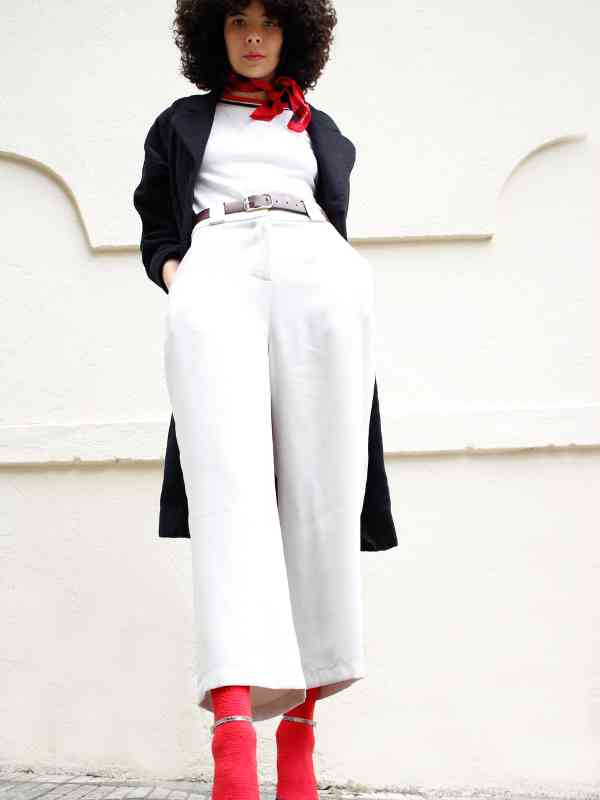 Style-a-Longline-Cardigan-Over-a-Slip-Dress-and-Ankle-Boots-for-a-Layered-Spring-City-Look-With-Movement