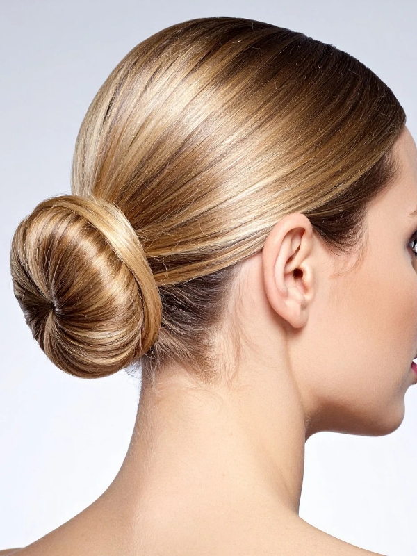 The-Effortless-Low-Bun-With-Face-Framing-Tendrils-A-Spring-Hairstyle