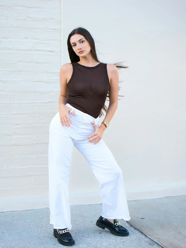 Wear-Wide-Leg-Trousers-With-a-Fitted-Graphic-Tee-and-Loafers-for-a-Cool-Spring-School-Outfit-With-Personality