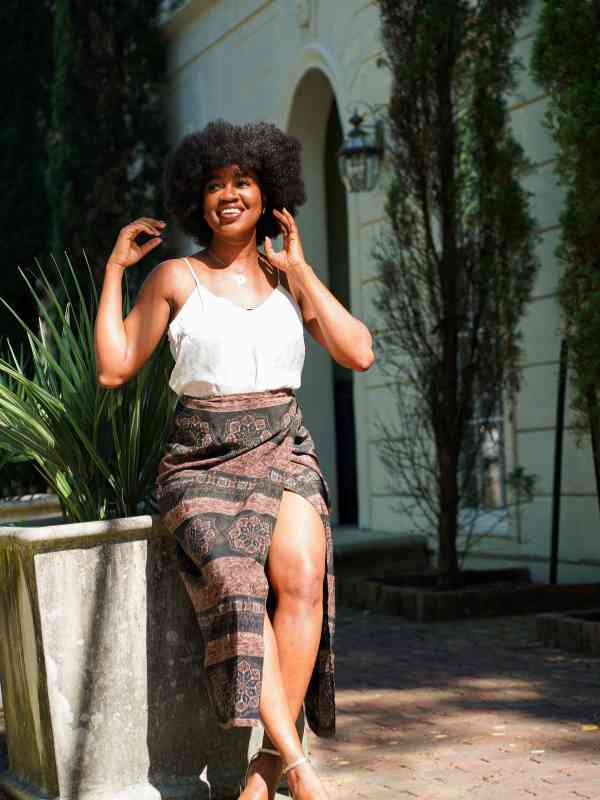 Wear-a-Midi-Wrap-Skirt-With-a-Simple-Fitted-Top-and-Flat-Sandals-for-a-Feminine