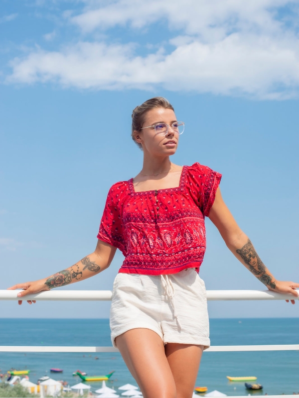 White-Eyelet-Shorts-and-a-Red-Linen-Blouse-for-a-Fresh-Patriotic-Daytime-Look