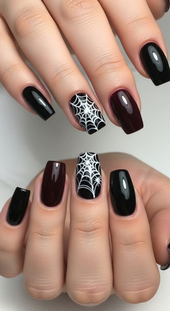 Spiderweb-Accent-Nails-with-Solid-Black-Pedicure-halloween-finger-and-toe-nail-ideas.