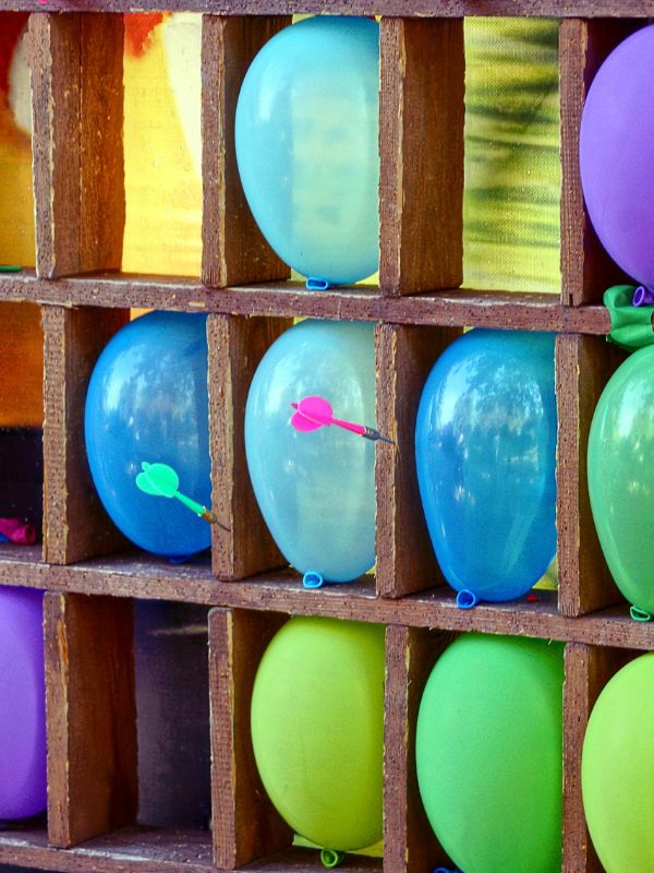 a-balloon-dart-board-perfect-for-gender-reveal-party-ideas