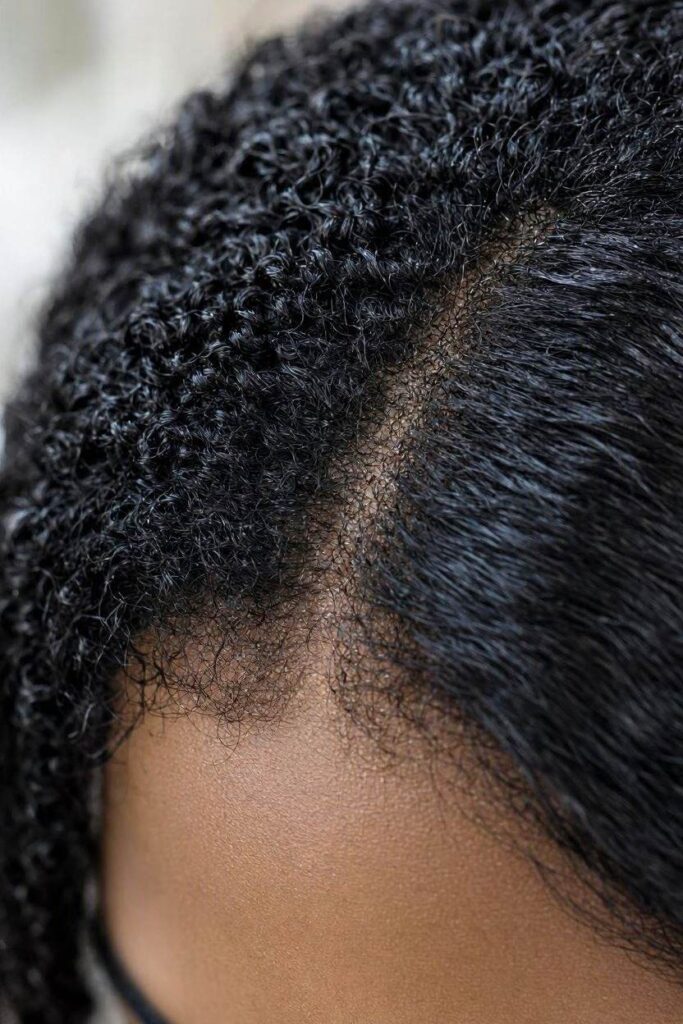 An_ultra-realistic_macro_photograph_of_a_section_of_Black_hair