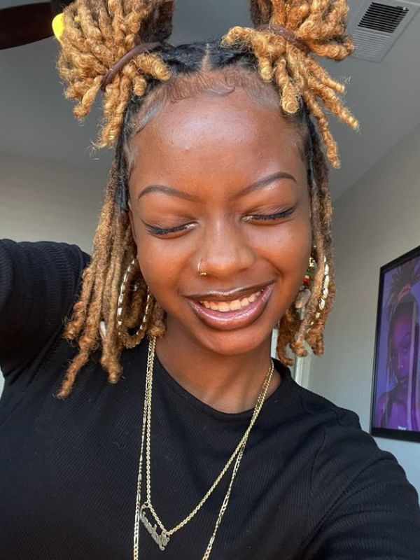 colorful-locs-in-a-space-bun-style