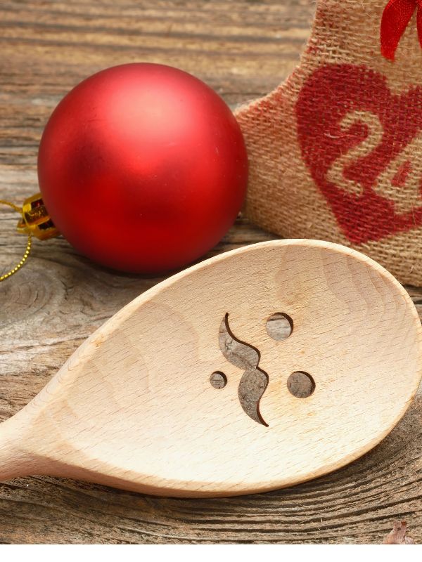 a-display-of-a-wood-burned-wooden-spoon