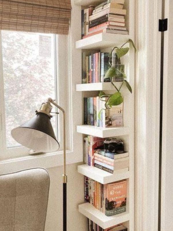 Slim-Bookcase-Along-an-Empty-Wall-Small-Bedroom-Storage-Ideas